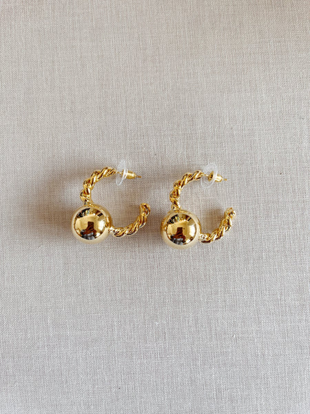 Small hoop store earrings with ball